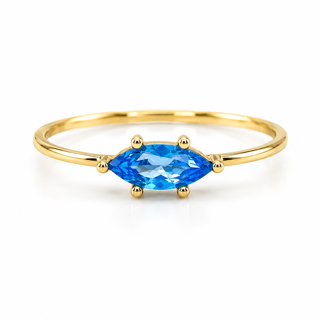Ring aus 585 Gelbgold mit blauem navetteförmigem Zirkonia
