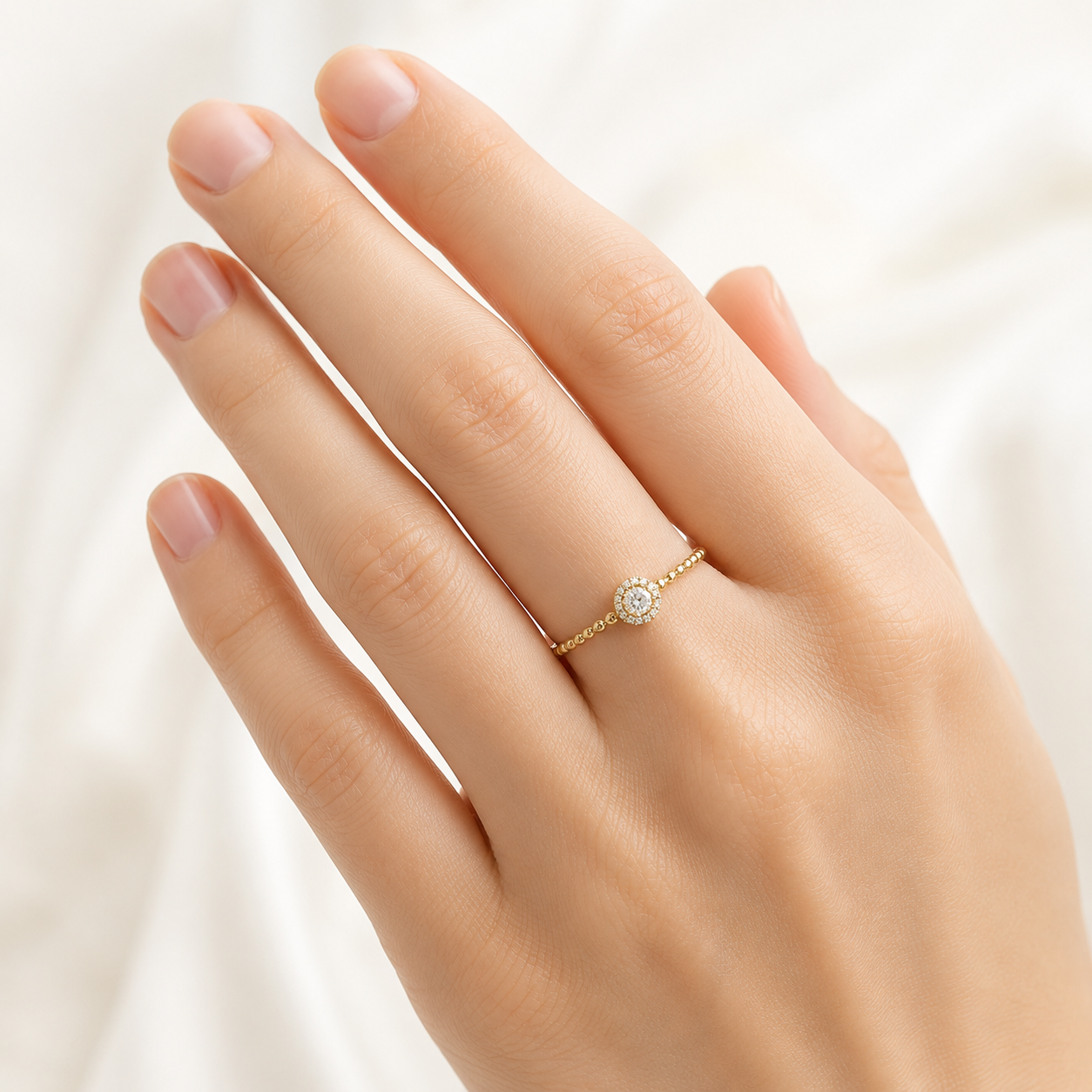 Gelbgold Ring mit Kugelschiene und 0,14 ct Diamanten G-SI