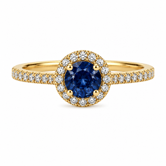 750 Gelbgold Ring mit blauem Saphir und Brillanten in Halo-Fassung
