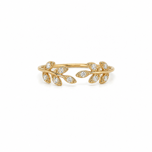 Offener Brillantring aus 585 Gelbgold mit 0,10 ct W-SI Brillanten im Blattdesign.
