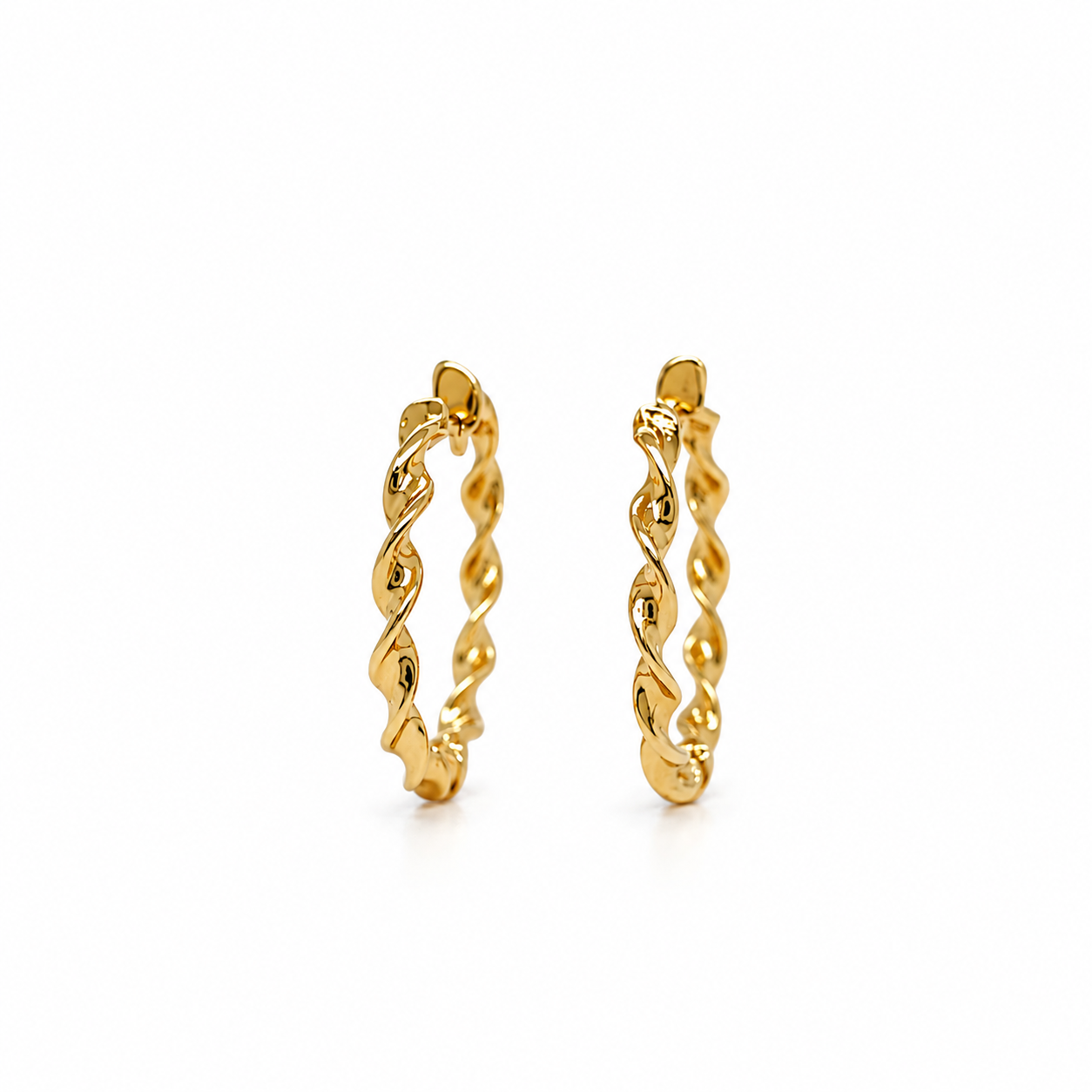 Twist Creolen aus 585 Gelbgold mit Wellenstruktur