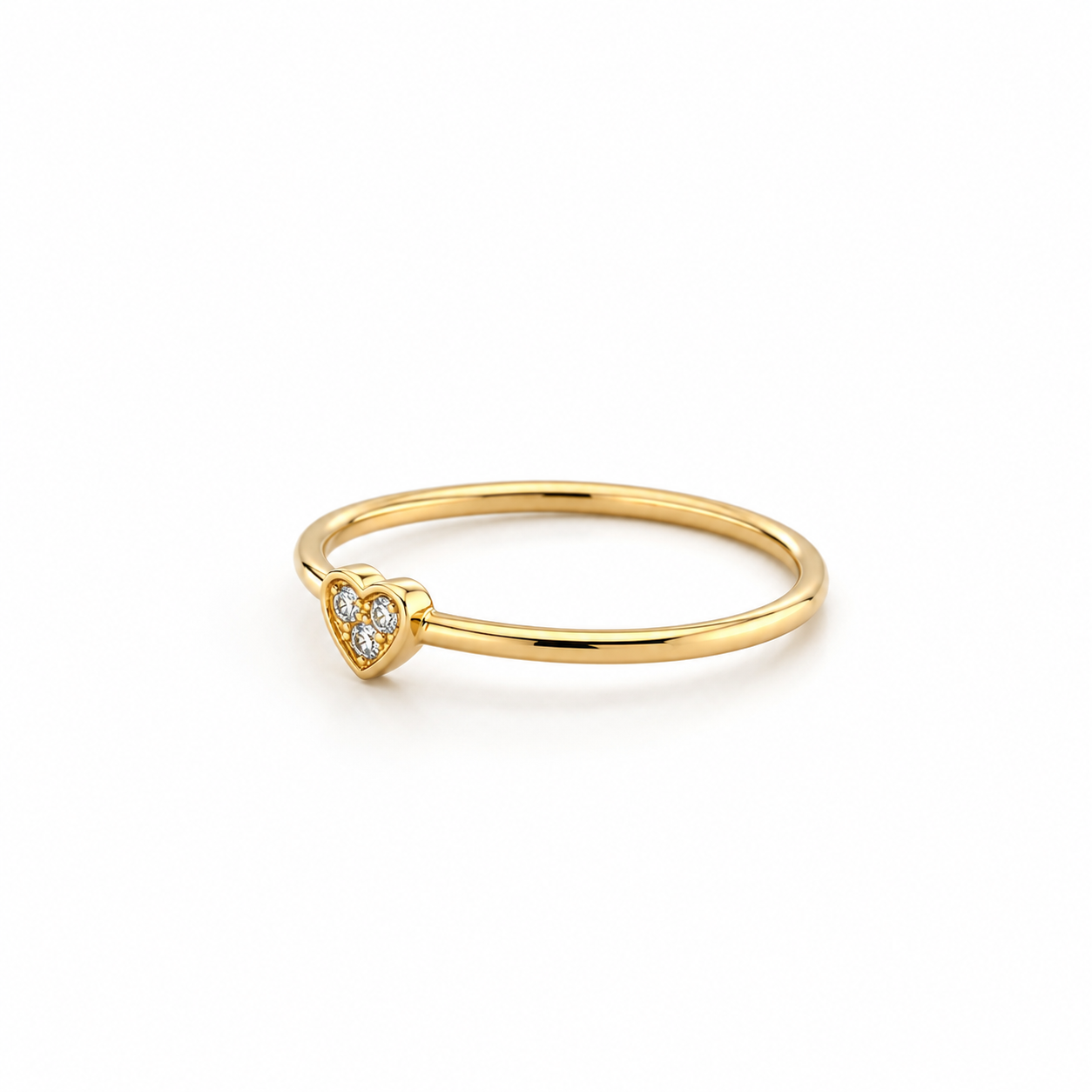 Goldring mit Herz und drei Zirkonia-Steinen