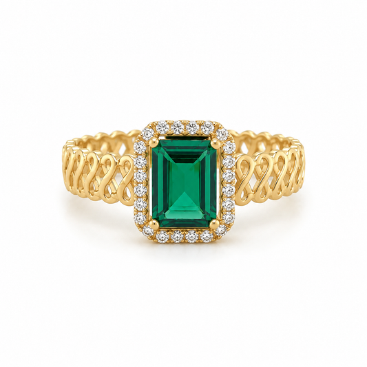 Infinity Ring aus 585 Gelbgold mit grünem Zirkonia