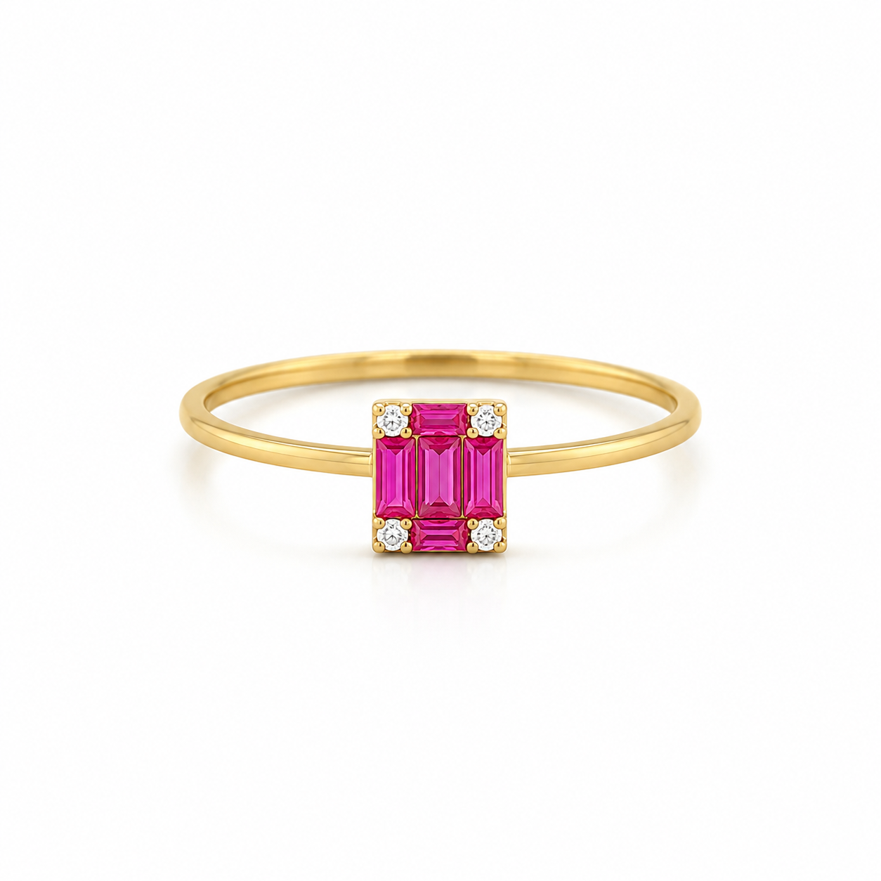 Ring aus 585 Gelbgold mit pinken Zirkonia im Baguette- und Smaragdschliff