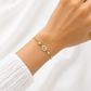 Doppelarmband aus Gelbgold mit Zirkonia getragen am Handgelenk