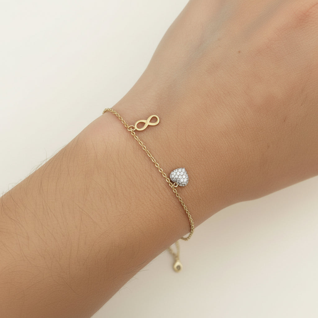 Bettelarmband aus 585 Gelbgold & Weißgold mit Zirkonia-Symbolanhängern