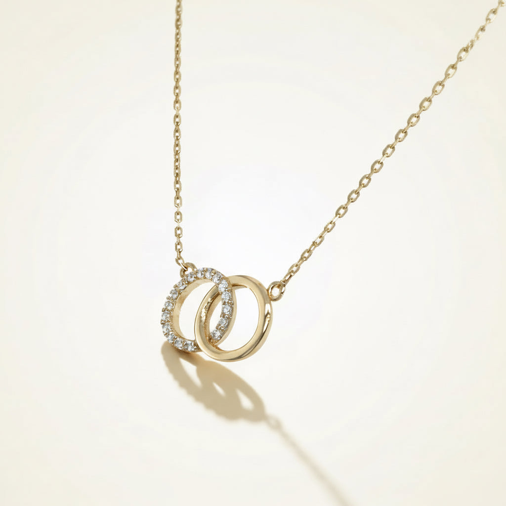 Zirkonia besetzter Ringanhänger aus 585 Gelbgold