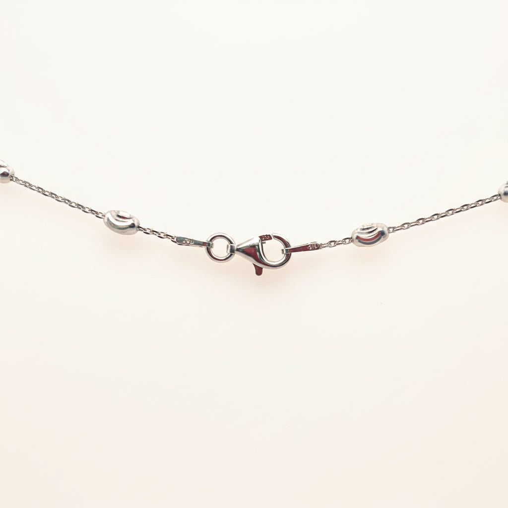 Silber Schmuckset Damen – Kette & Armband mit ovalen, diamantierten Kugeln