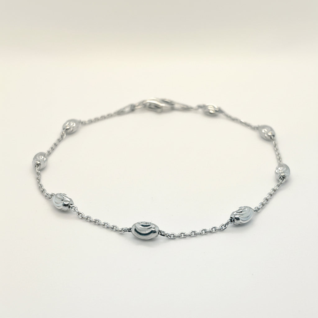Silber Schmuckset Damen – Kette & Armband mit ovalen, diamantierten Kugeln