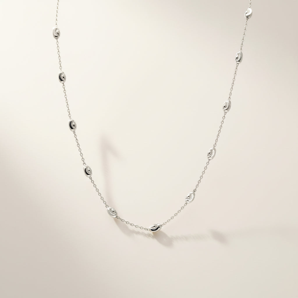 Silber Schmuckset Damen – Kette & Armband mit ovalen, diamantierten Kugeln