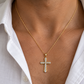 Kreuz Anhänger aus 585 Gold mit Zirkonia in Gelbgold und Weißgold an Kette getragen