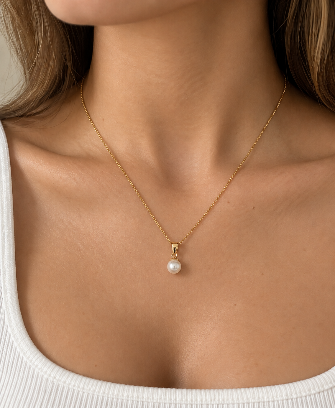 Perlenkette aus 585 Gelbgold mit Süßwasserzuchtperle 7–8 mm getragen