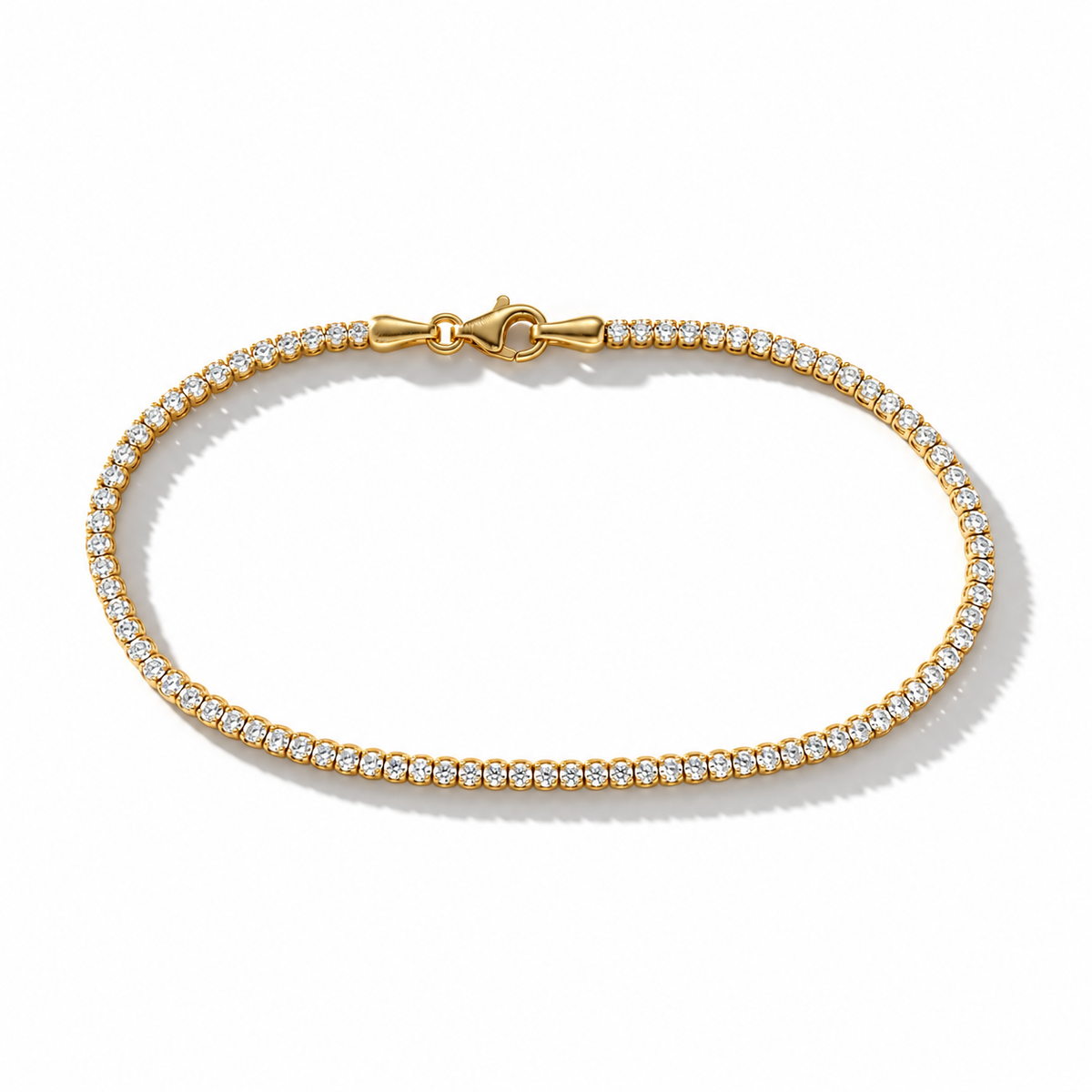 Tennisarmband aus 585 Gelbgold mit einreihigem Zirkoniabesatz und Karabinerverschluss in Frontansicht