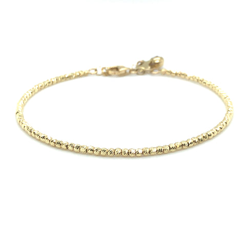 Armreif 585/-Gelbgold Kugelmuster geriffelt